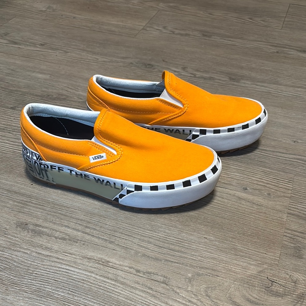Vans Bold Orange Slip-Ons with Checkered Accents